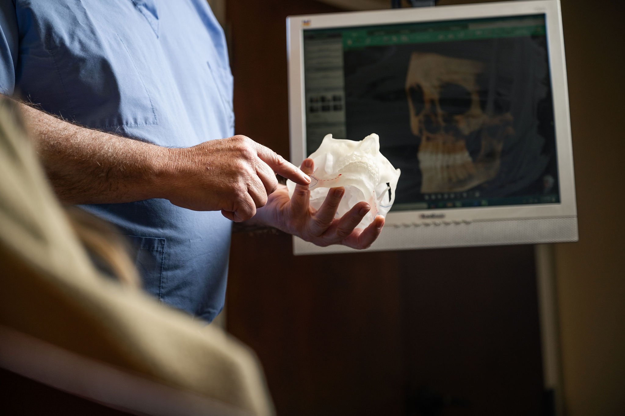 Dr. Haigney with jaw model